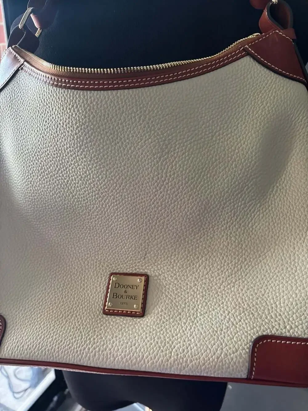 Dooney and Bourke White Leather Hobo Bag with Brown Trim,